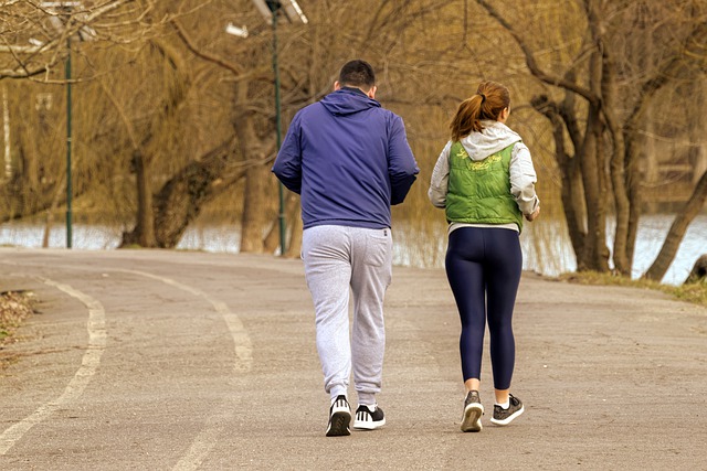A Young Couple Jogging in the Park