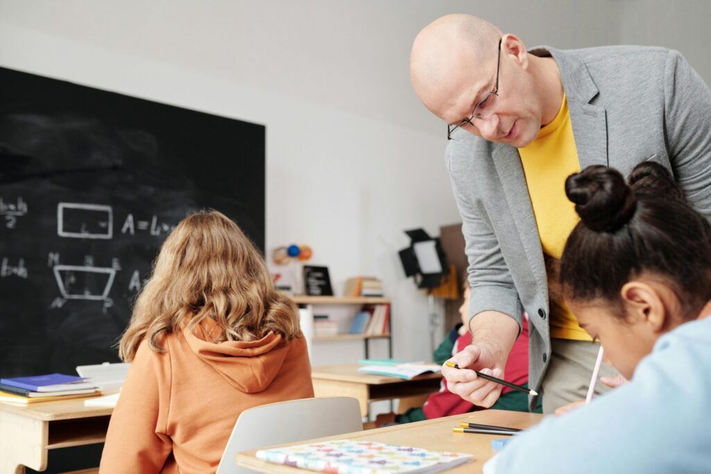 a techer helping a student
