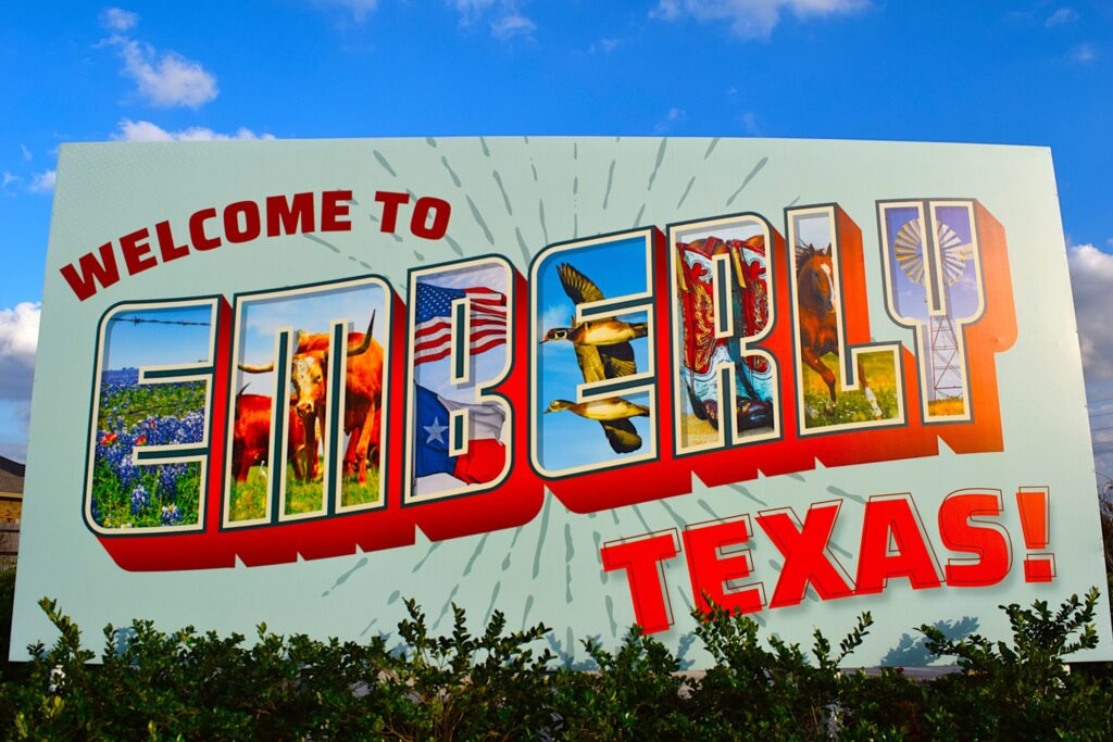 a huge signage of Emberly neighborhood sign