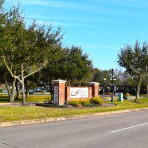 An image showcases the entrance of the Avalon Sugar Land neighborhood.