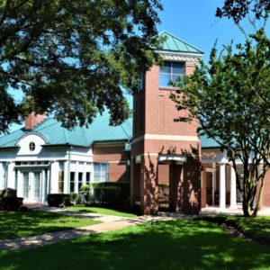 The photo showcases the huge beautiful brick homes style at the Commonwealth, Sugar Land.